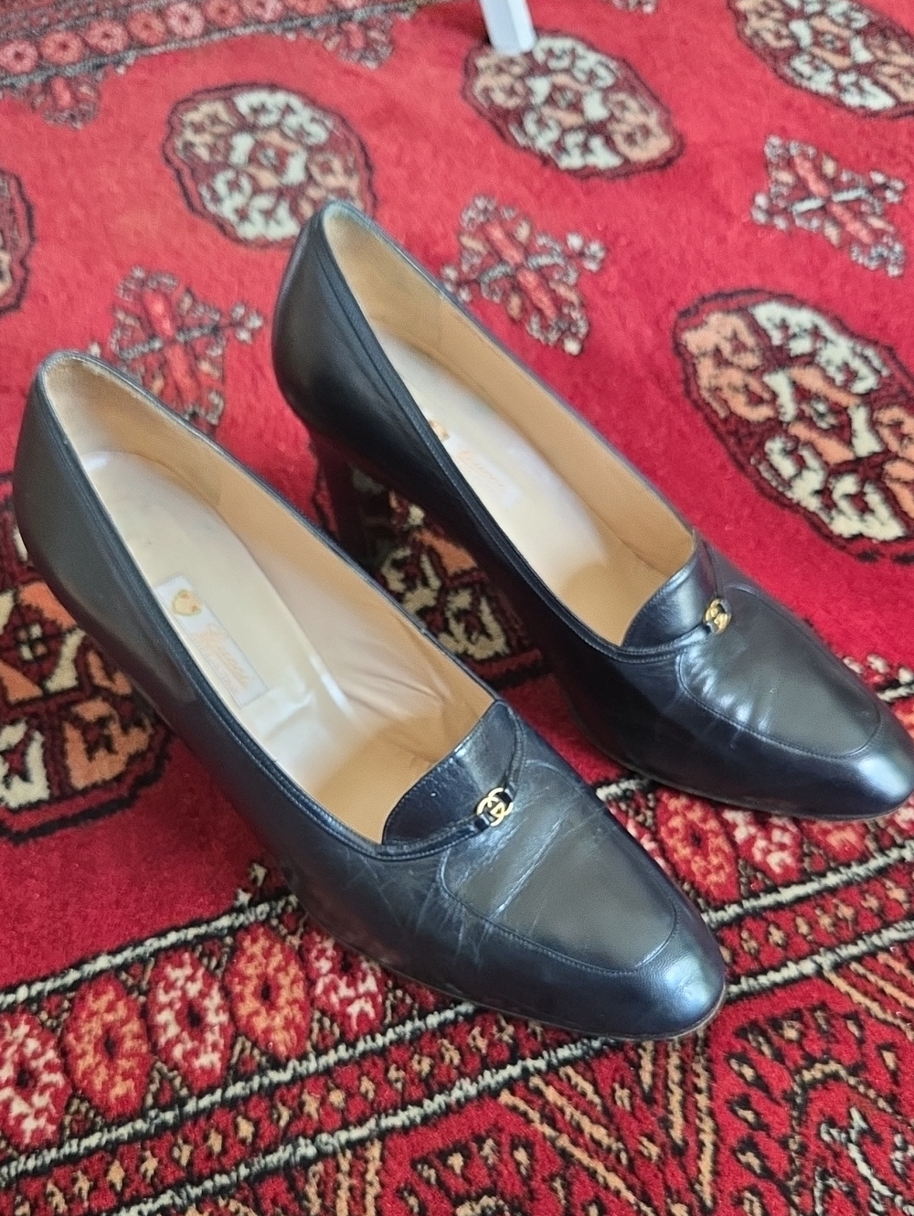 Gucci Black Leather Mid-Heel Pumps with Gold Double-G Accent